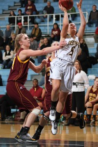 Julia Dysthe goes up for a layup over Alex Lippert.
