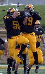 Zach Lundquist celebrates a defensive stop with Colby Peterson.