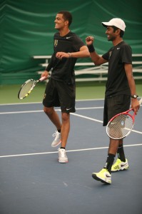 Amrik Donkena and Mya Smith-Dennis celebrate their win at No. 1 doubles against Saint John's.