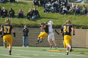 Torey Asao came up with a crucial interception in the end zone to help Gustavus defeat Saint John's on Nov. 2.  Photo courtesy of Sport PiX.