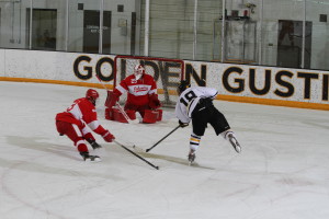 Gustav Bengtson moves in and takes shot from the right circle. 