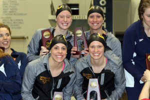 The 400-medley relay team on the podium after its fifth place finish on Thursday night. 