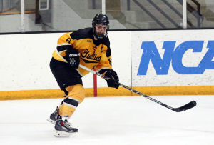 Tyler Lapic scored both Gustavus's regulation goals and added another in the shootout. 