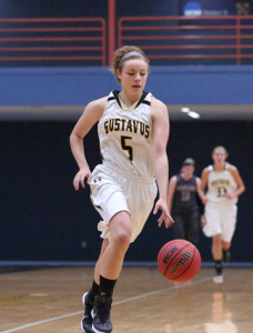 Kelsey Carpenter races down the court on a breakaway.  Carpenter led Gustavus's bench with nine points.  