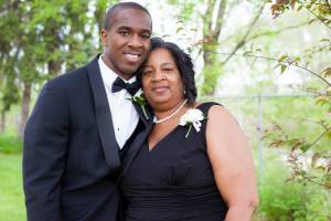 Cooper with his mother, who he credits as the one to spur him to think about his future after high school.