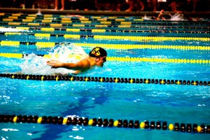 Hutsell competing as a member of the Gustavus swim team.