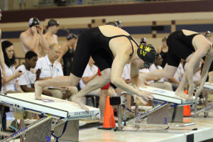 Katie Olson bolts off the blocks in the 100 free. 
