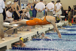 Kate Reilly dives in to swim her leg of the 400-free relay. 