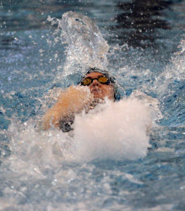 Hayley Booher swims the backstroke in the 200-medley relay. 