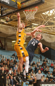 Brody Ziegler goes out in style, throwing down a dunk for his final career basket. (photo by AJ Dahm)