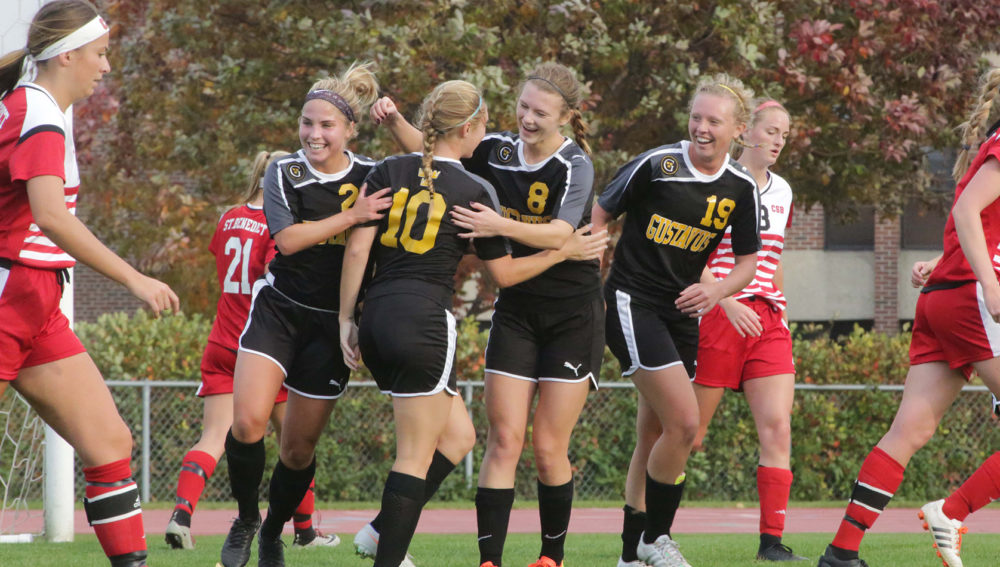 Katie Johnson and teammates celebrate her first career goal in Black and Gold.