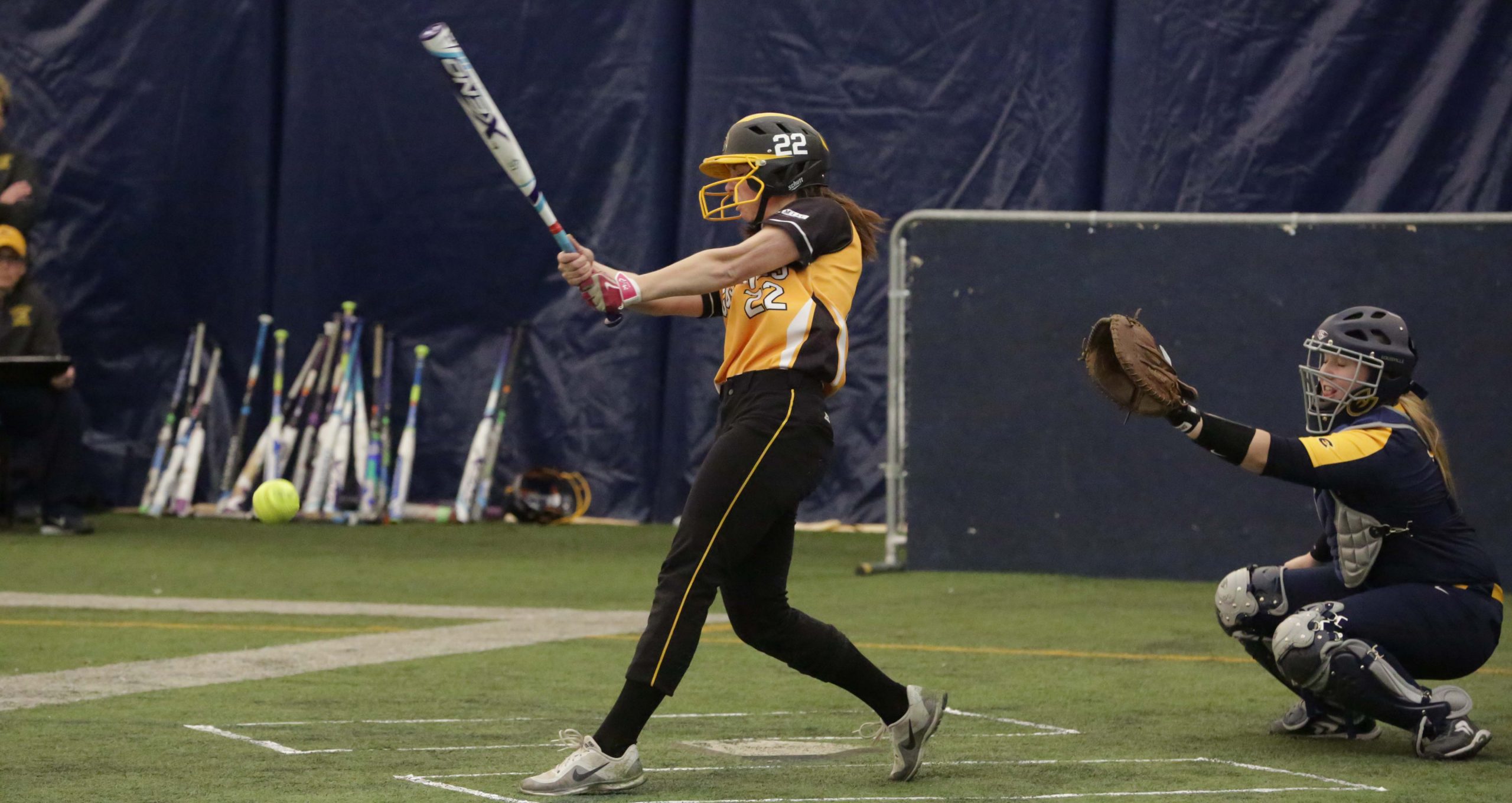 Softball Splits On Opening Day