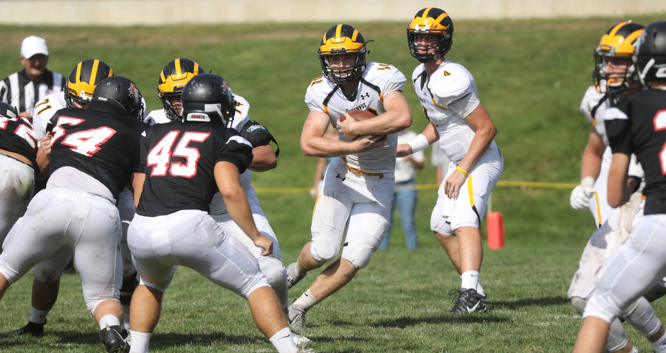 Football Bounces Back After Slow Start, Defeats Martin Luther 32-20 in Season Opener