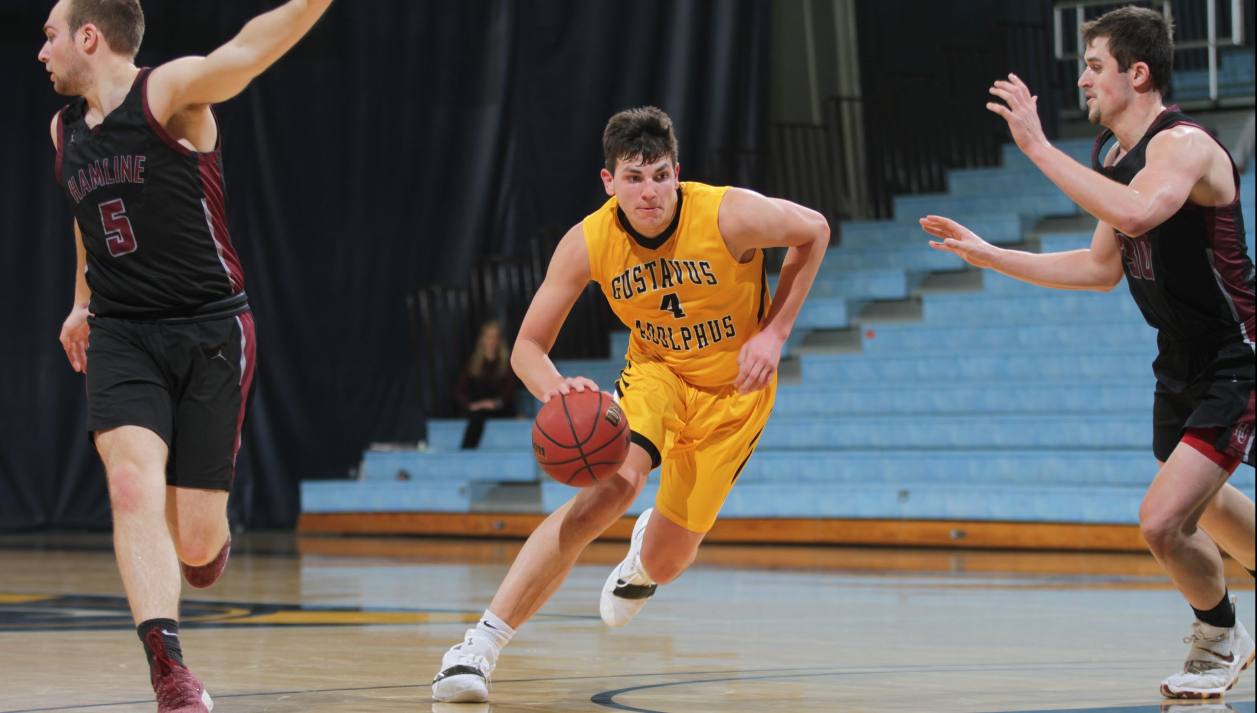 Men’s Basketball Holds Off Hot Shooting Pipers