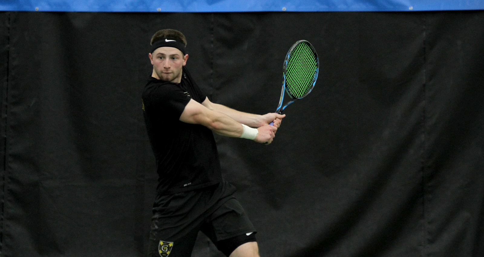 Men’s Tennis Falls to WashU in ITA Indoor Consolation Semis